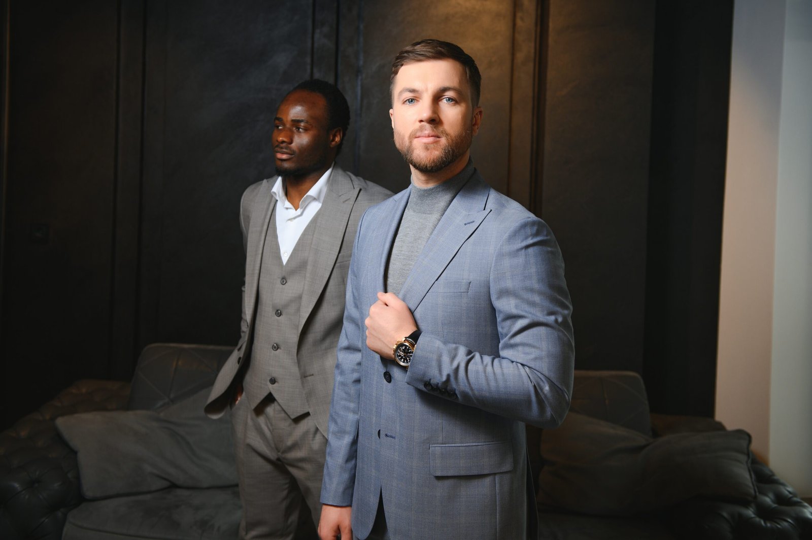 portrait of two handsome young men in elegant classic suits. men's beauty, fashion